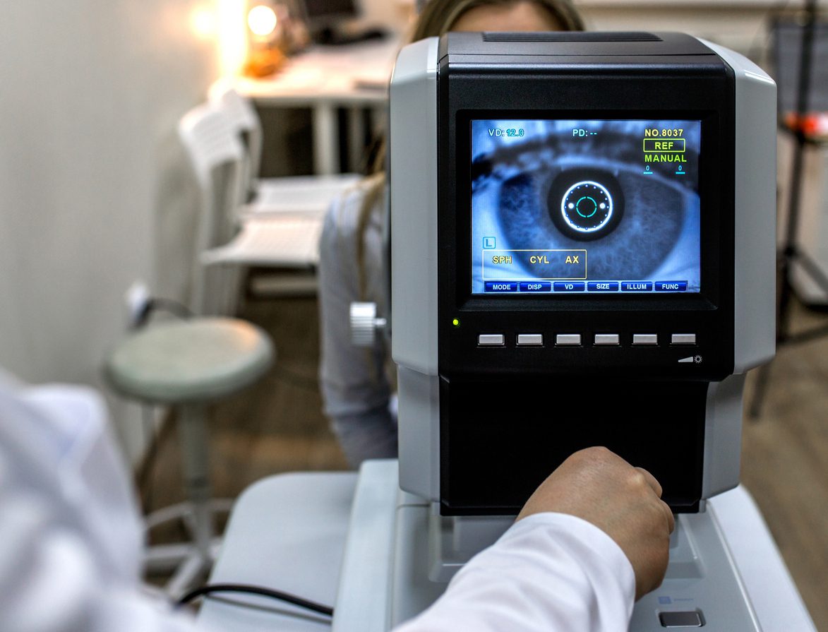 Woman during an eye exam at the eye doctor's office